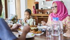 A family eating a meal together.