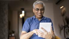 Older man using a tablet