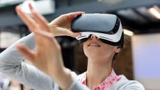 A woman wearing a virtual reality headset